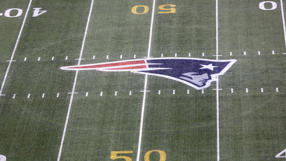 The gold 50 yard marker and Patriots logo is seen on the filed before the New England Patriots play against the Pittsburgh Steelers during an NFL football game, Thursday, Sept. 10, 2015, in Foxborough, Mass.